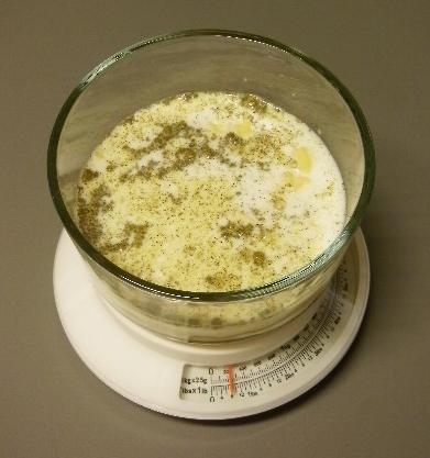 Image of 8 ounces of milk added